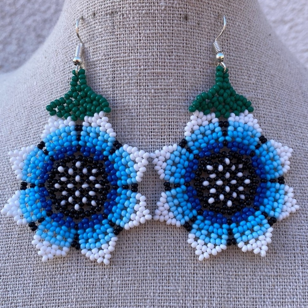 Handmade chakira bead sunflower earrings. Huichol art by artisans in Mexico